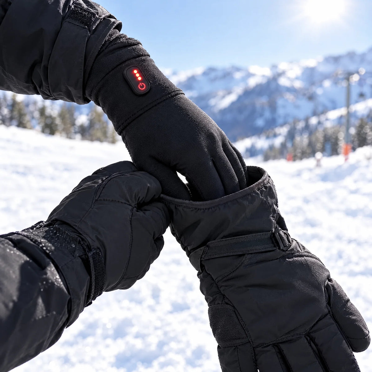 Heated glove liner worn under a ski glove
